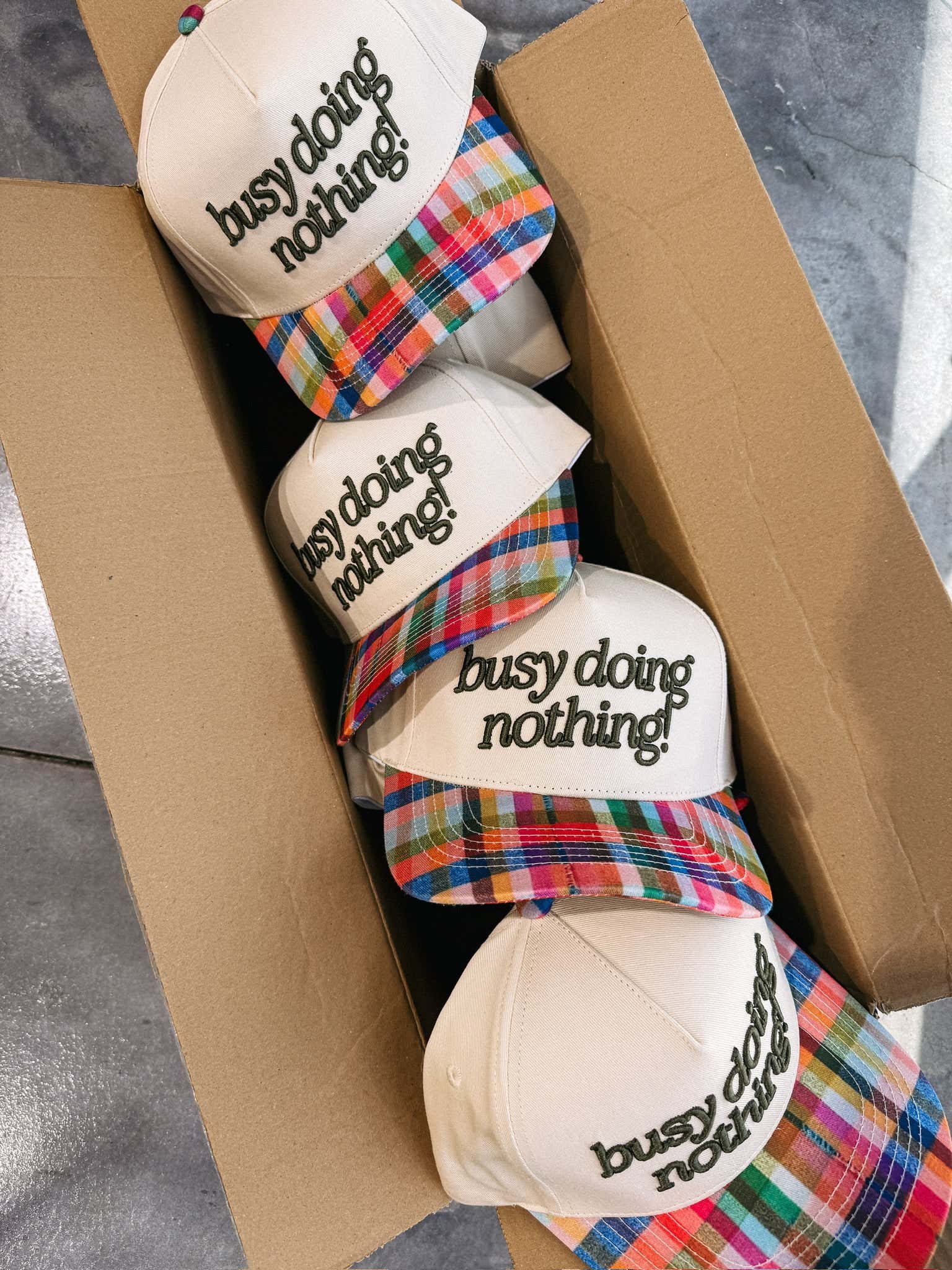ETTA OG | busy doing nothing trucker hat - multi plaid