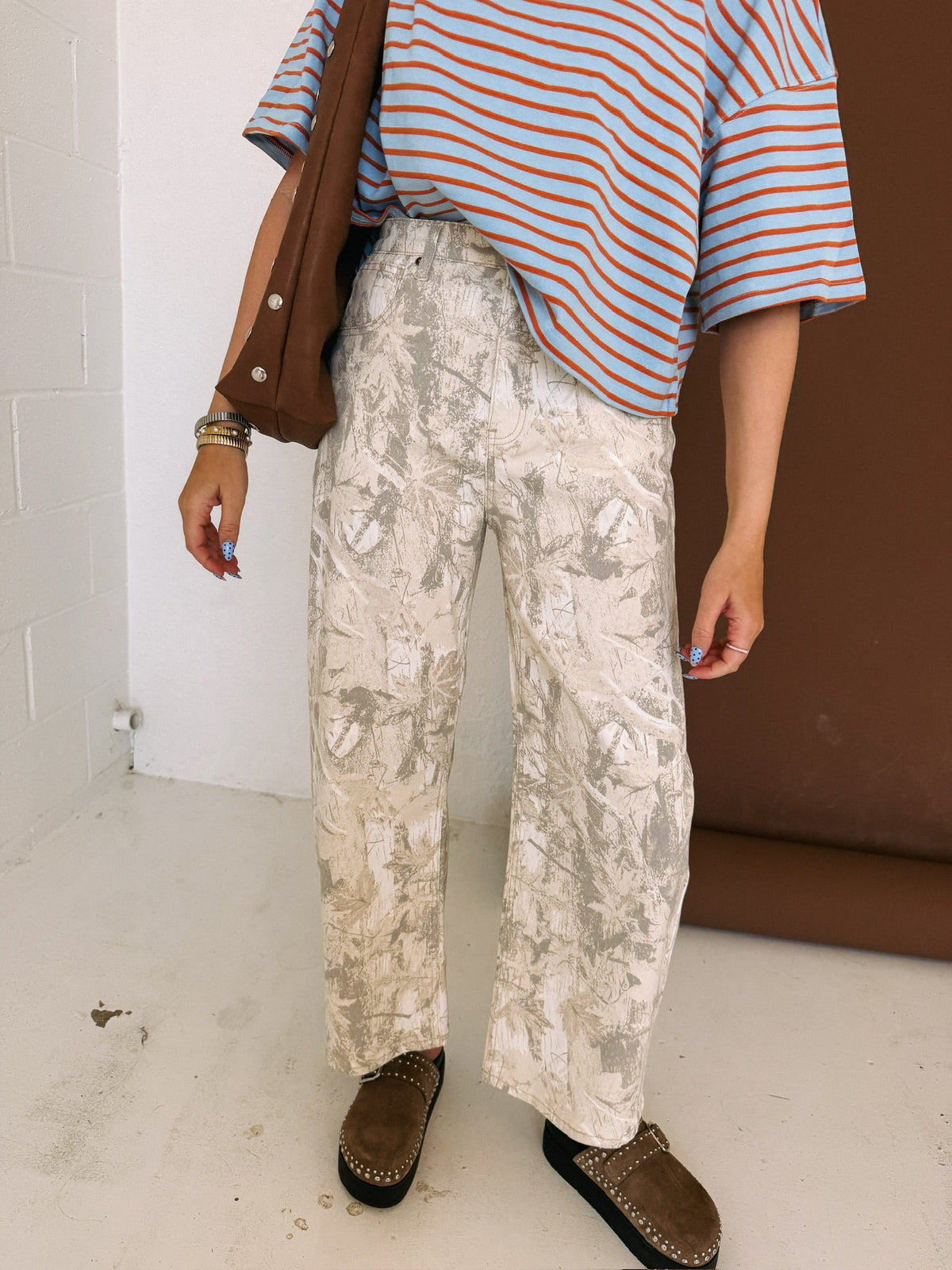faded camo curve barrel jeans