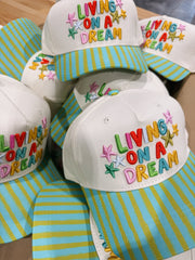 ETTA OG | living on a dream trucker hat - blue / green
